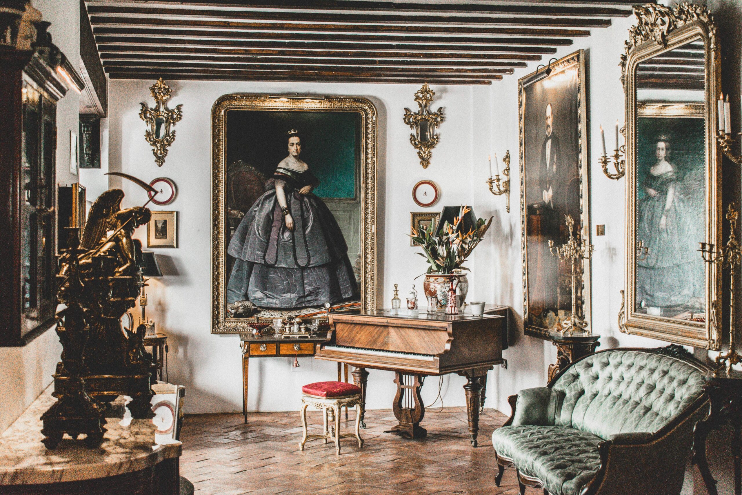A collection of antique art and collectibles in a historic themed room